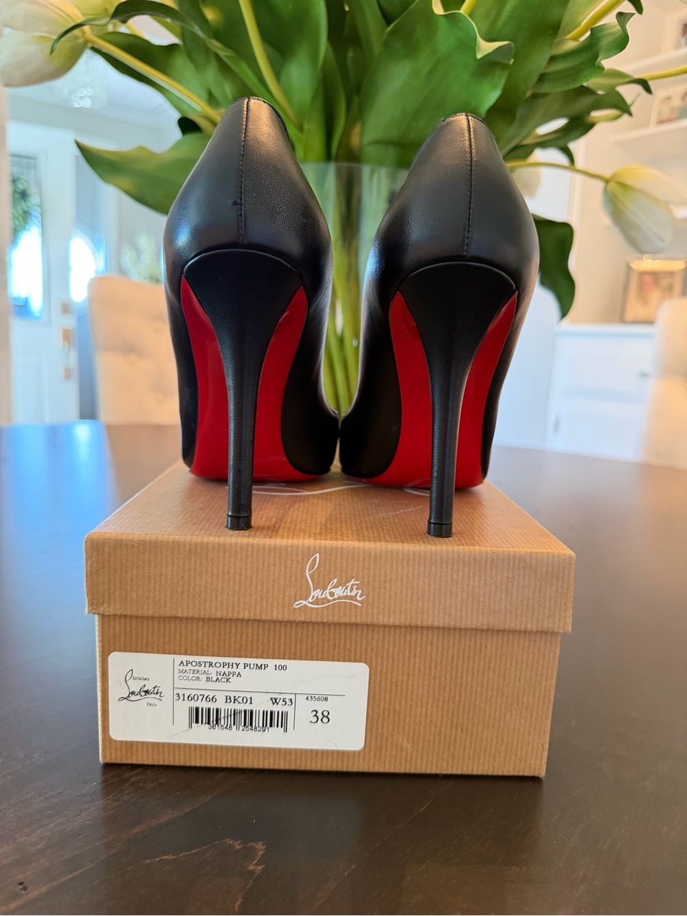 Christian Louboutin Black Leather Pumps with Signature Red Soles